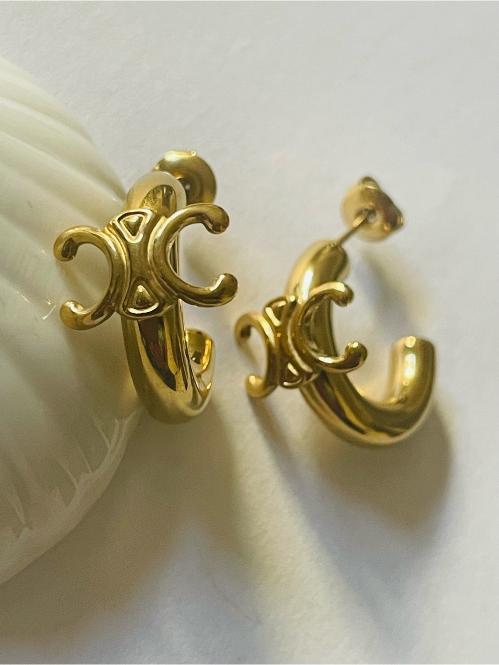 Gold Tone Hoop Earrings with Decorative Double C logo Motif